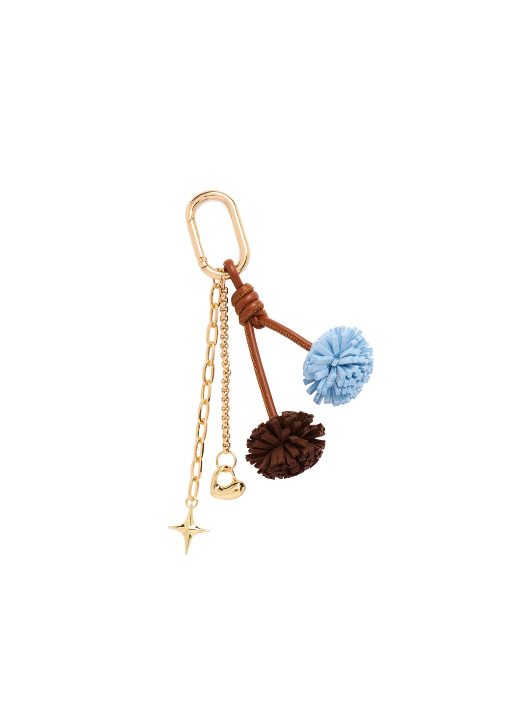A gold-tone keychain or bag charm featuring a brown leather cord with two knotted pom-poms (one light blue, one dark brown), a gold-tone chain, a small gold bell, and a star-shaped charm, all attached to a gold carabiner.