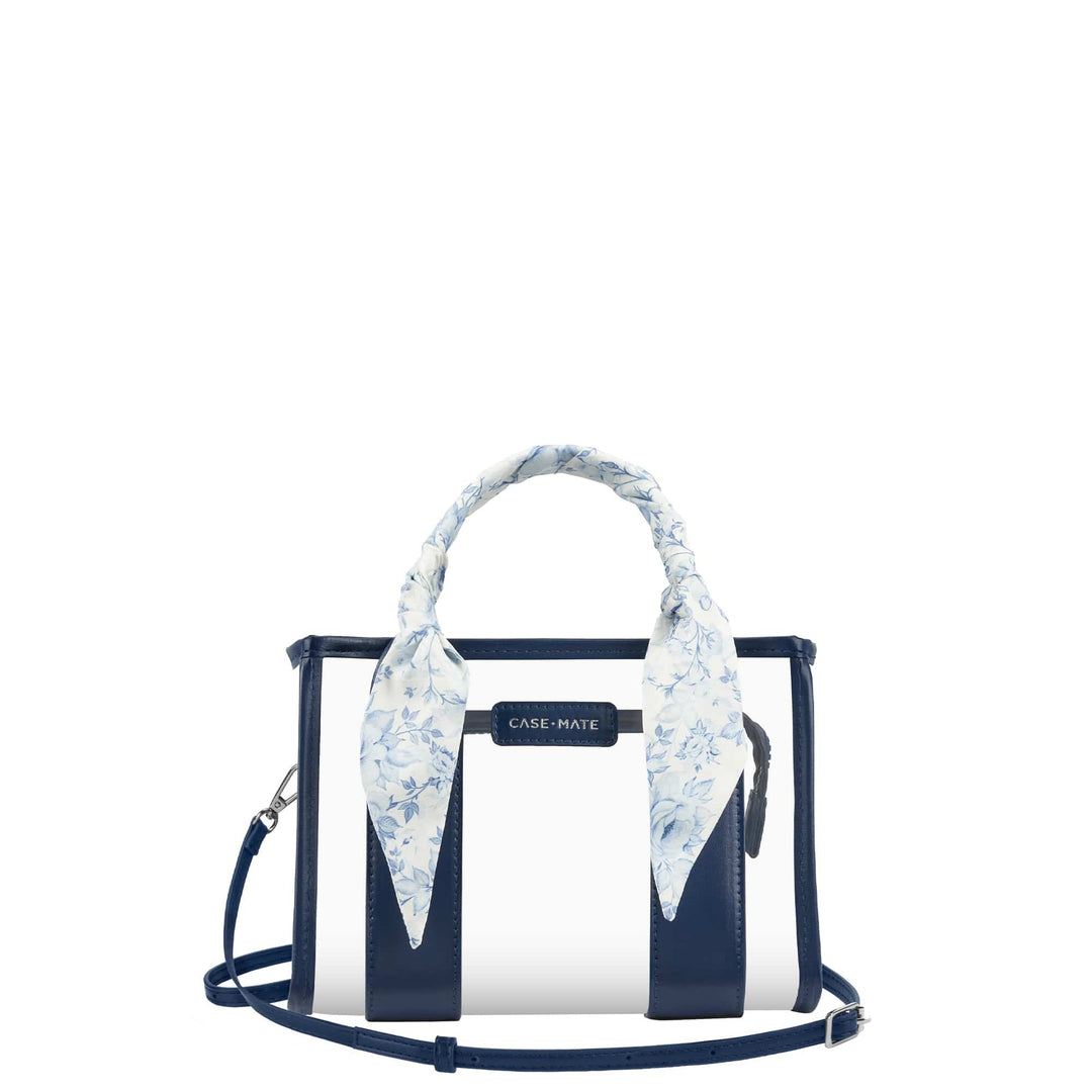 A Case-Mate structured handbag with a white and navy blue striped design, featuring a light blue and white floral patterned scarf tied around the top handle, set against a plain white background.