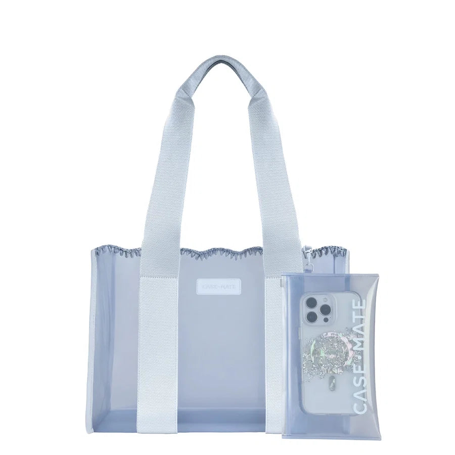 A light blue transparent tote bag with white shoulder straps and a matching clear phone case attached to the front, shown on a plain white background.