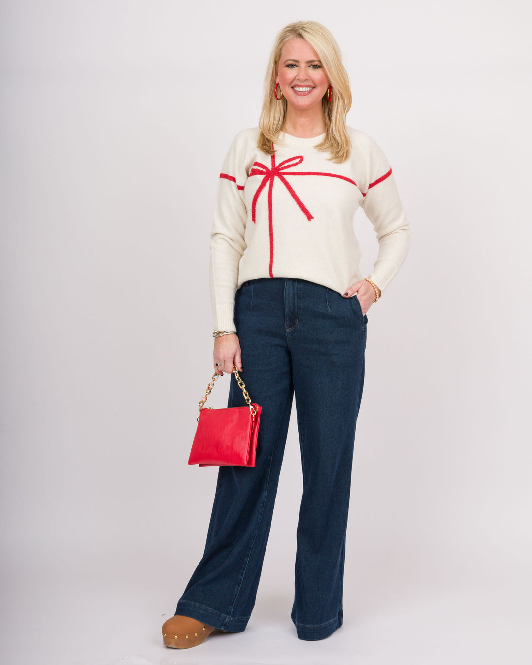 White Sweater with Red Bow
