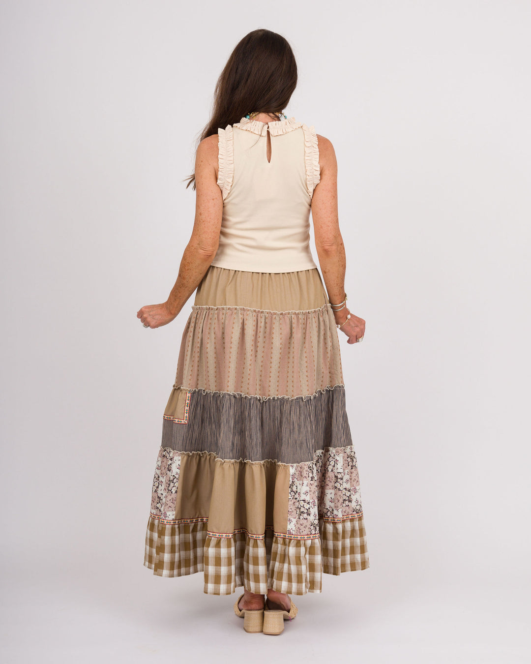 Bone Ruffled Sleeveless Top