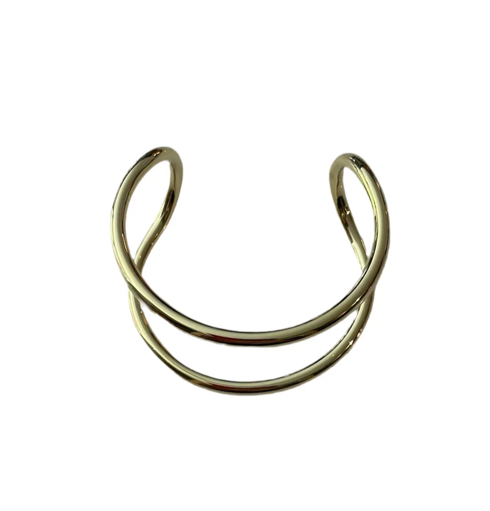 Gold open ring on a white background