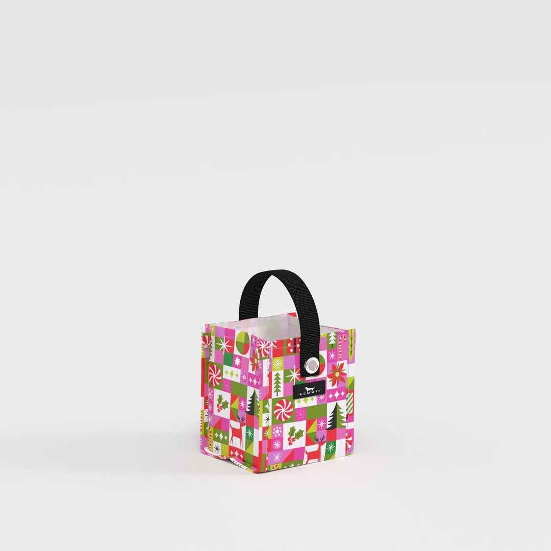 A small square gift bag with a colorful holiday-themed pattern featuring pink, green, and white candy cane and Christmas motifs, complete with a black handle and a silver button closure.