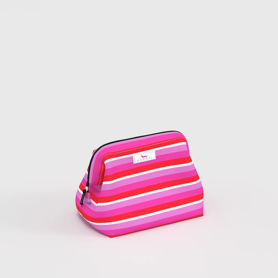 A small zippered cosmetic pouch with horizontal pink, magenta, red, and white stripes, featuring a small white brand label on the front, set against a plain light gray background.