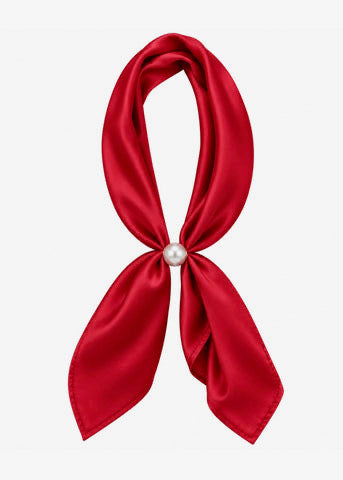 A red satin neck scarf tied in a loop with a single pearl at the center, shown against a plain white background.
