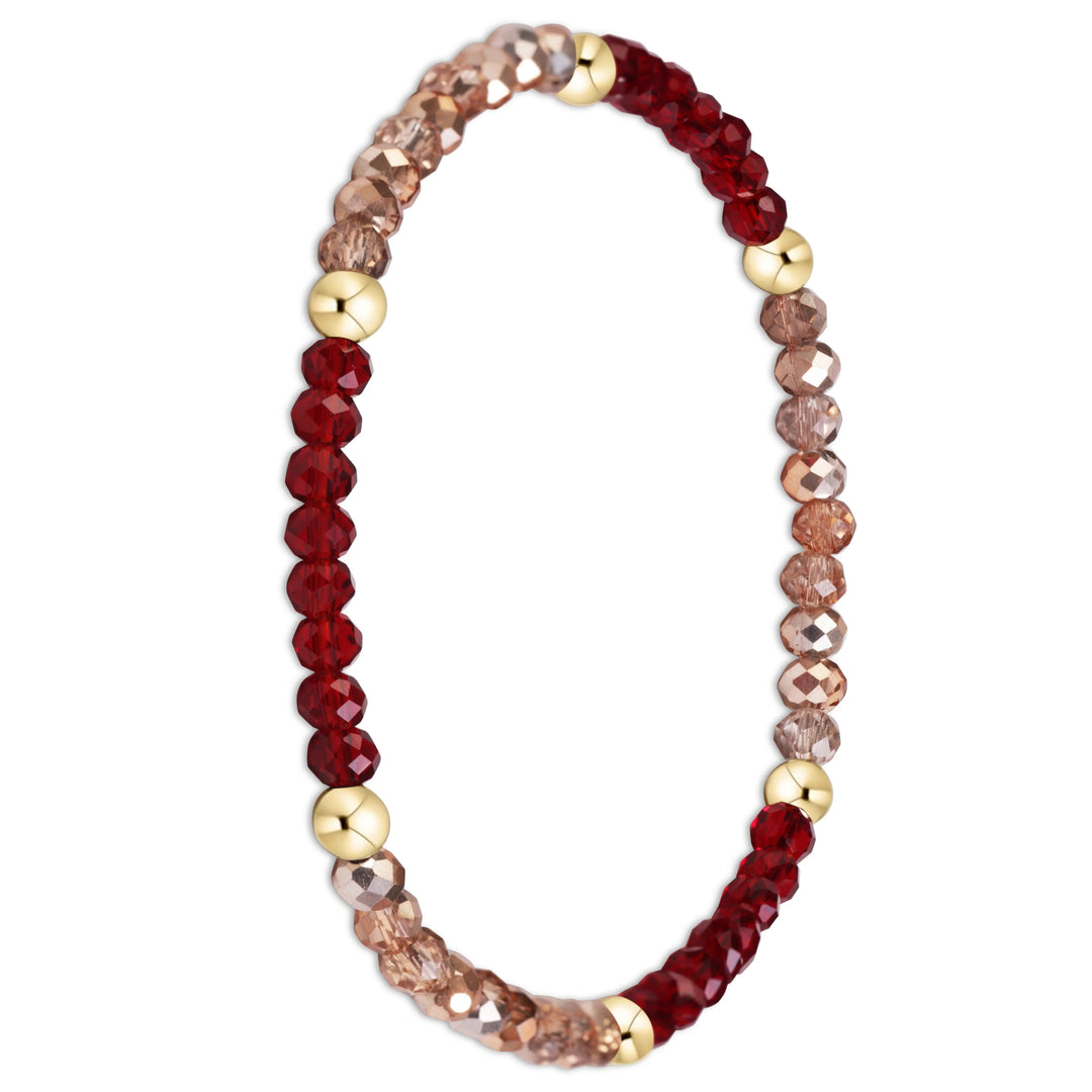 A beaded stretch bracelet featuring faceted deep red beads, faceted light brown and champagne-colored beads, and polished gold metal spacer beads, shown on a plain white background.