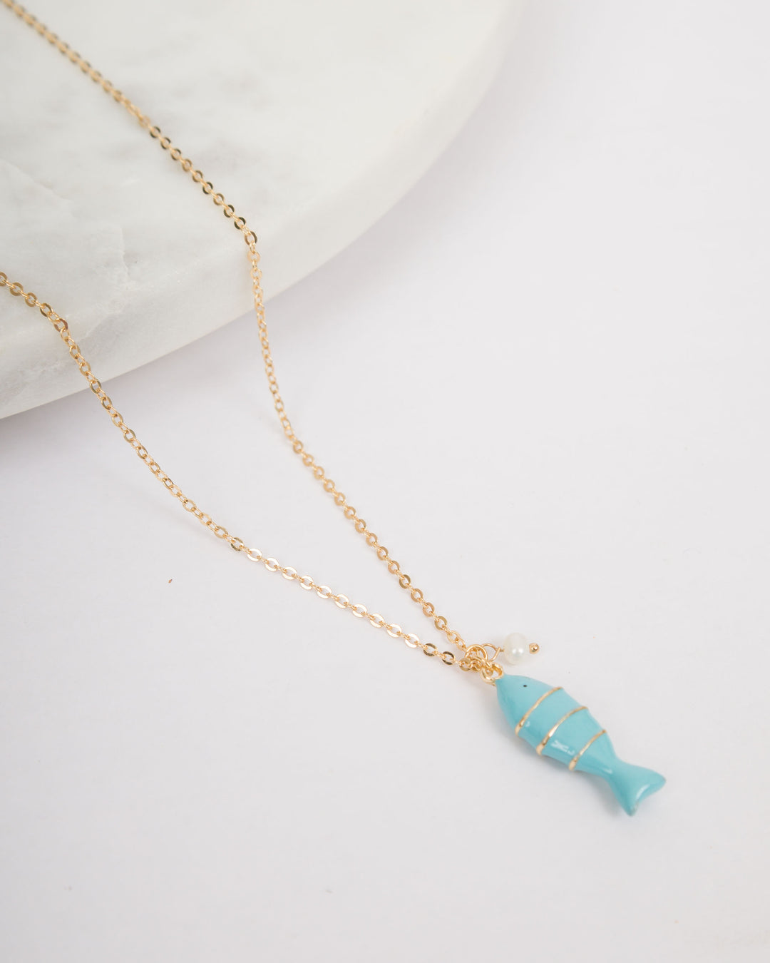 Color Coated Fish with Pearl Necklace