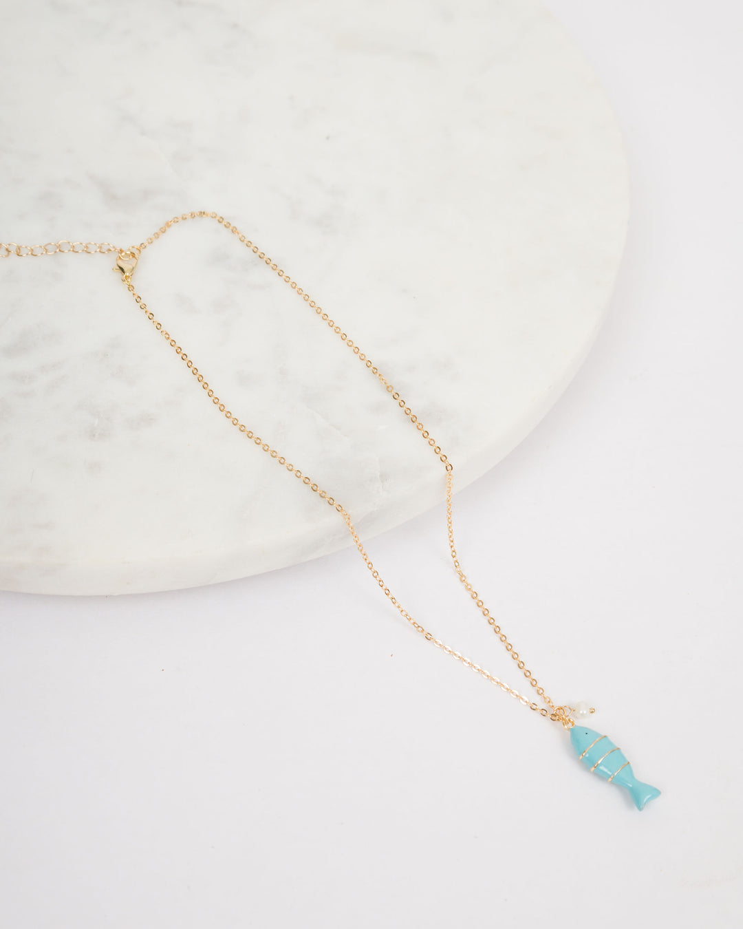 Color Coated Fish with Pearl Necklace