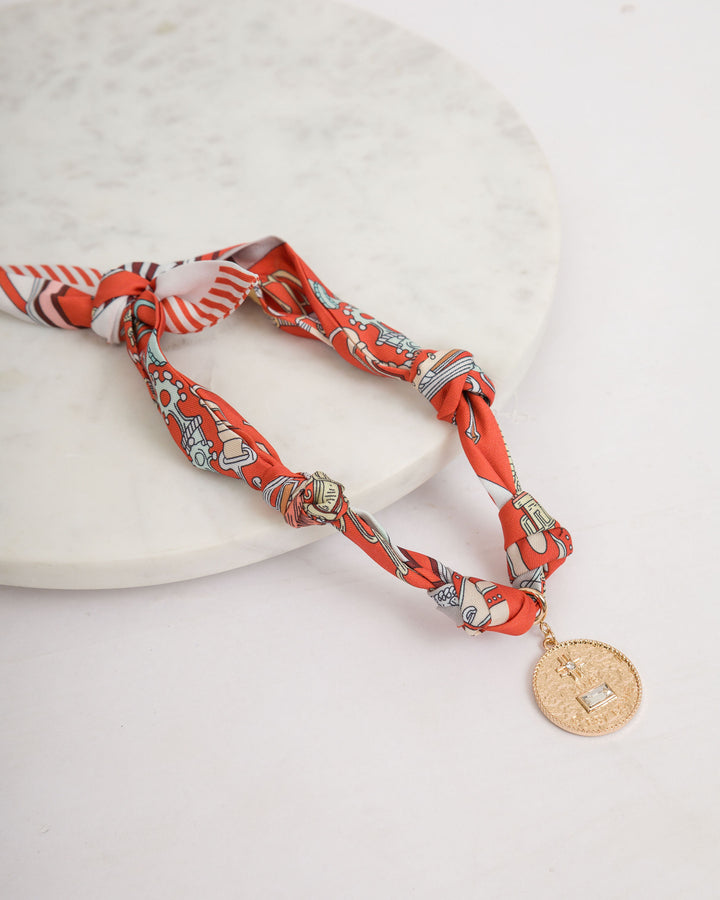 Orange Knotted Scarf Necklace with Coin Pendant