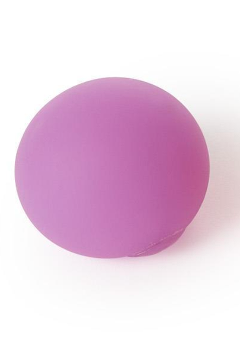 A smooth, matte purple silicone ball, likely a massage or bath bomb container, shown on a clean white background.
