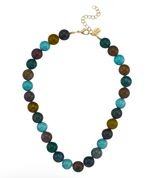 A beaded necklace featuring alternating round beads in dark teal, forest green, brown, and turquoise, finished with a gold-tone clasp and extender chain.