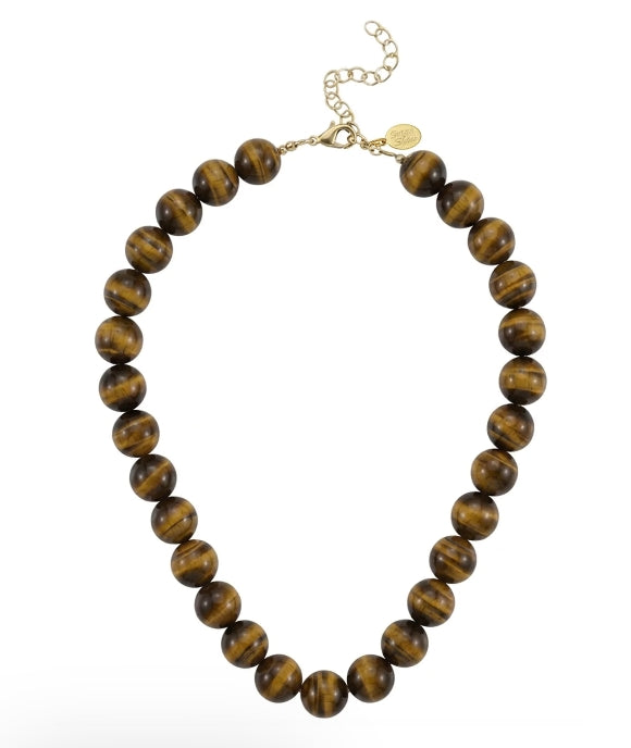 A beaded necklace made of polished brown tiger's eye beads with a gold-tone clasp and extender chain, shown on a plain white background.