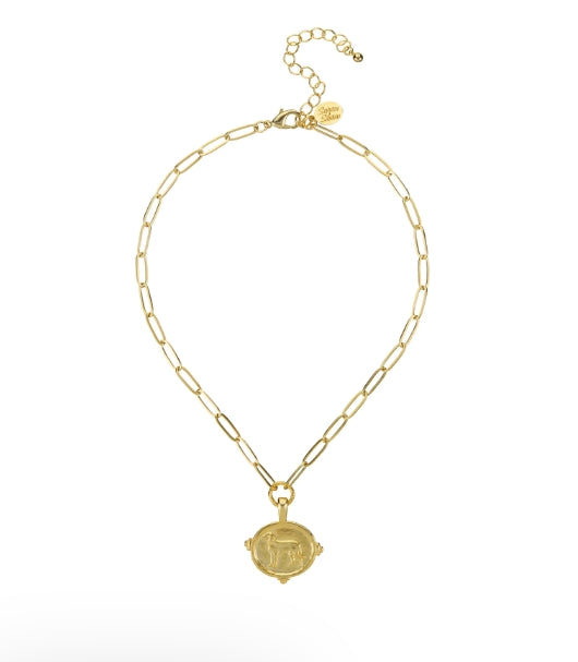 A gold paperclip chain necklace with a circular pendant featuring a retriever dog, displayed on a clean white background.