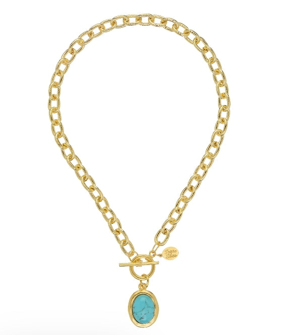 A gold chain necklace with a toggle clasp and an oval turquoise pendant, displayed on a clean white background.