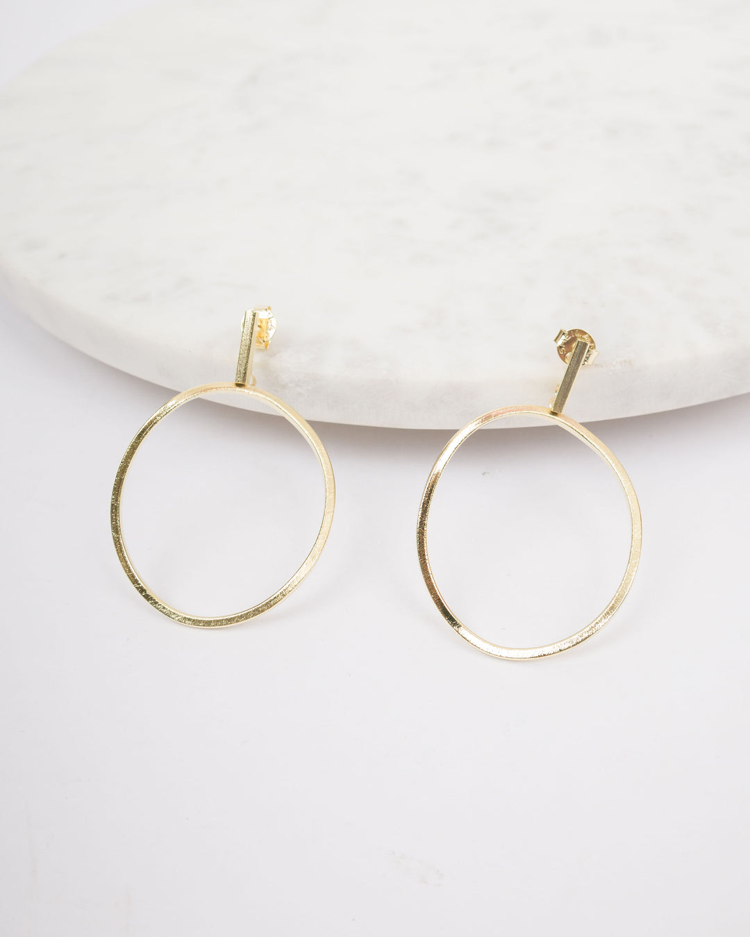Sheila Fajl Twisted Oval Hoop Earrings