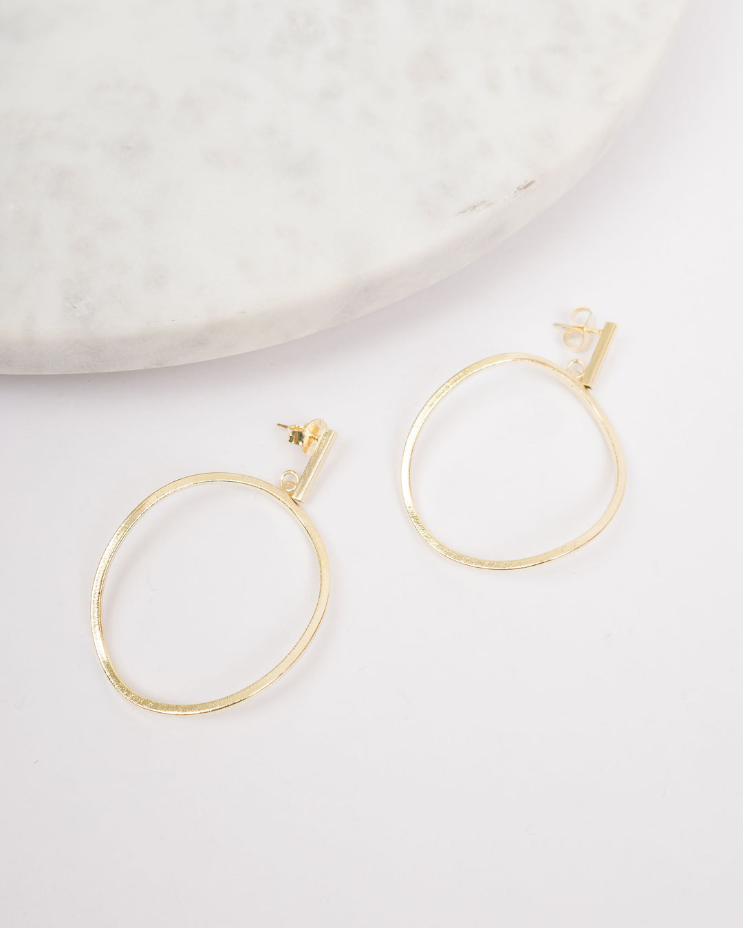 Sheila Fajl Twisted Oval Hoop Earrings
