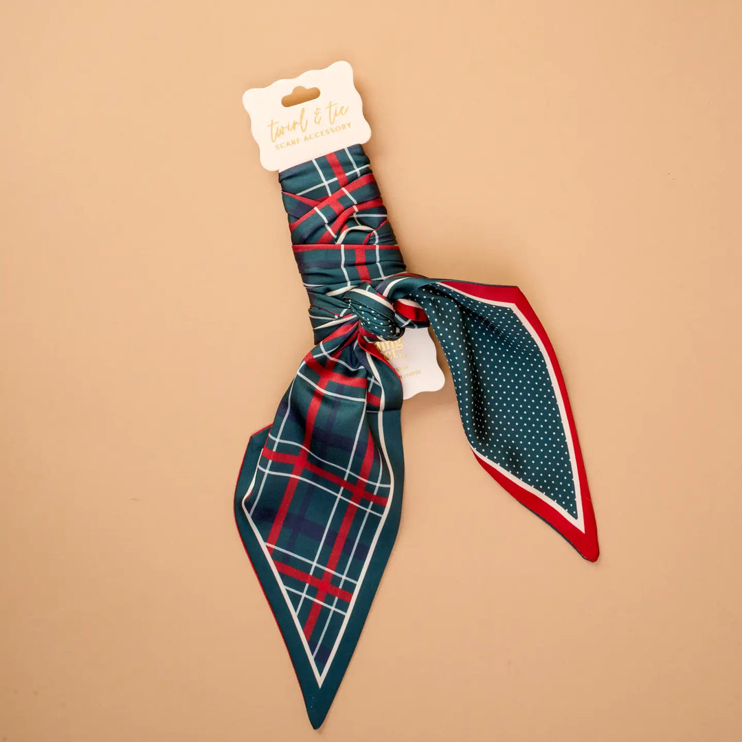 Plaid and polka dot scarf on a beige background