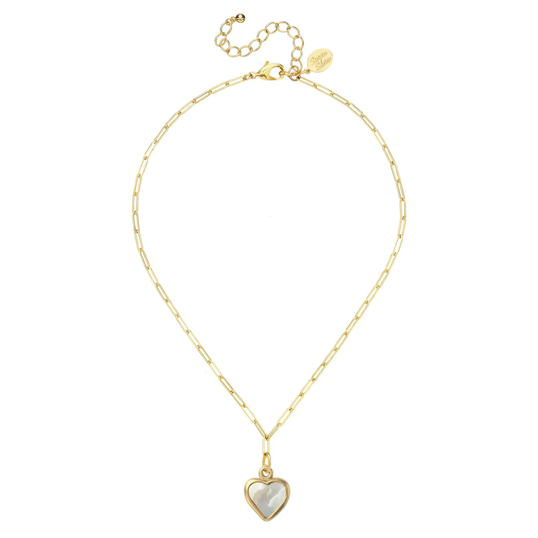 A gold chain necklace featuring a heart-shaped pendant with a white mother-of-pearl inlay, displayed on a clean white background.